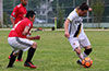 Manuel Ramos of Hampton Construction trying to get by Alexis Sanchez of Sag Harbor(left)