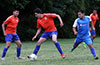Juan Sebastian(center) of EH Soccer Fever controlling the ball