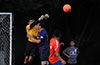 Esteban Aguilar of EH Soccer Fever punching the ball away from Antonio Padilla of Maidstone Market