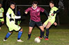 Mark Bako of East Hampton(center) protecting the ball from Carlos Rodriguez(left) and Jose Almansa of Maidstone