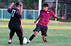 Jorge Naula of East Hampton(right) about to steal the ball from Cristian Compuzano of FC Tuxpan