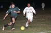 Dan Thorp of Bayberry(left) trying to get by a Tuxpan defender