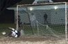 Alex Mesa of Maidstone stopping the 4th penalty kick taken by Mario Robles of Tuxpan