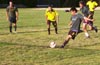 Marco Bautista of Bayberry taking a penalty kick that he would miss