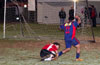 Alejandro Bolanos of Bateman protecting the ball from Nettie Sanchez of ED-Tuxpan