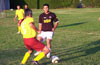 Fabian Arias(#5) of Hamptons Arsenal about to get by Gehider Garcia of Maidstone Market