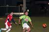 Rodolfo Marin of Tortorella Pools(left) can not get the ball before Nettie Sanchez of FC Tuxpan