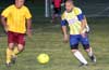 Juan Carlos Reyes of 75 Main(left) and Jonathan Rolden of FC Tuxpan going for the ball