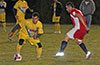 Carlos Portillo of FC Tuxpan(left) trying to get by Daniel Londono of Tortorella Pools