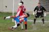 Fabian Arias of The Hideaway(front) diving to prevent Eddie Lopez of Tortorella Pools to the ball