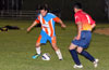 Romulo Tubatan of The Hideaway protecting the ball from Mario Robles of FC Tuxpan