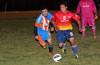 Nettie Sanchez of FC Tuxpan(right) a bit too fast for Marco Bautista of The Hideaway