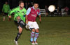 Jose Almonsa of Hampton FC(left) about to trap the ball in front of John Romero of Maidstone Market