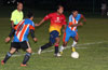 Hector Hernandez of FC Tuxpan(center) surrounded by Marco(left) and Christian Bautista of The Hideaway