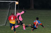 Marco Bautista of The Hideaway(#10) takes a shot that goes by Antonio Chavez's hands and hits the cross bar