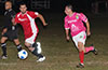 Daniel Londono of Tortorella(left) and Luis Munoz of FC Tuxpan racing toward the ball