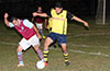 Roger Quiceno of Maidstone(left) protecting the ball from Juan Zuluaga of Bateman