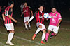 Esteban Uchupaille of Cuenca FC(center) about to blast the ball past Orlando Bautista of FC Tuxpan