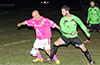 Ivan Espinoza of FC Tuxpan(left) holding off Jose Almansa of Hampton FC