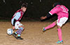 Josue Zurdo of FC Tuxpan(right) kicking the ball past Andy Gonzalez of Maidstone