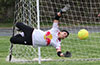 Luis Bautista of Cuenca FC jumping to grap the ball as Cesar Bautista plans to block it
