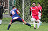 Gehider Garcia of Maidstone Market(#8) about to trap the ball in front of Stiven Orrego of Tortorella Pools