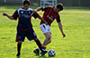 Ernesto Valverde of Maidstone(left) about to steal the ball from Juan Villancencio of Cuenca FC(right)