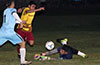 Hampton FC keeper, Duvan Castro, sliding to block the dribbel by Jarge Melgar of FC Tuxpan