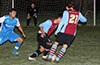 Cristian Munoz of Tortorella Pools looks on as Mario Olaya(center) and Esteban Valverde of Maidstone fight for the ball