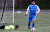 Injuried Alejandro Bolanos of Tortorella Pools on the ground as team mate Rodolfo Marin clearing the ball