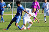 Brian Rios of Bateman(left) and Ivan Espinoza of FC Tuxpan fighting for the ball