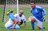 FC Tuxpan keeper, Samuel Marin, making another save in front of Luis Correa of Maidstone and Alfredo Negrete of Tuxpan