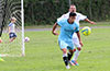 Orlando Bautista of FC Tuxpan(rear) guarding his net as Rafeal Godinho of Hampton FC keeps a close eye on the ball