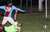 Hector Hernandez of FC Tuxpan sliding as Andy Gonzalez of Maidstone Market going for the ball
