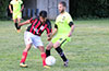 Oscar Torres of Sag Harbor(left) and Jose Almansa of Hampton FC fighting for the ball