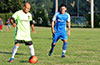 Hector Hernandez of FC Tuxpan(left) being guarded by Stiven Orrego of Tortorella Pools