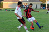 Marciel Correa of Bateman Painting(left) and Matthew Rojano of Sag Harbor fighting for the ball