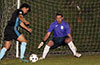 Jonathan Lizano of Bateman Painting misses the shot when the goal is guarded by Alex Mesa of Maidstone Market