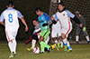 Jose Gutierrez of FC Tuxpan(center) surrounded by Sag Harbor players