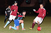 Juan Zuluaga of Bateman Painting(kneeling) hoping to get to the ball before Luis Correa of Maidstone Market can(right)