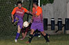Andre Perez of FC Tuxpan kicking the ball past team mate Alberto Carreto