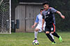 Cristian Flores of Hampton FC(front) trying to by Marlon Guzman of Sag Harbor