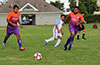 Wilber Flores(left) and Juan Carlos of FC Tuxpan going for the ball