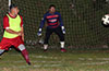Cristian Compuzano of FC Tuxpan(left) taking a shot