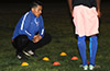 EH Soccer Fever coach,Michael Espana, talking strategy with his team mates