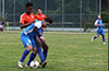 Mouhamadou Gaye(rear) of EH Soccer Fever and Eddie Lopez of Tortorella Pools fighting for the ball