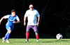 Eddie Lopez of Tortorella Pools(left) and Jose Gutierrez of FC Tuxpan(right) racing toward the ball