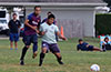 Who will get the ball first? Xavi Piedramartel of Maidstone(left) or Roberto Meza of FC Tuxpan