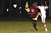 Donte Donigal of East Hampton FC(left) and Juan Zuluaga of Sag Harbor going for the ball