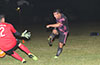 Jose Gutierrez of FC Tuxpan firing the ball against Alex Meza of Maidstone